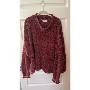 Listicle sweater. Size large. Rust/maroon color.